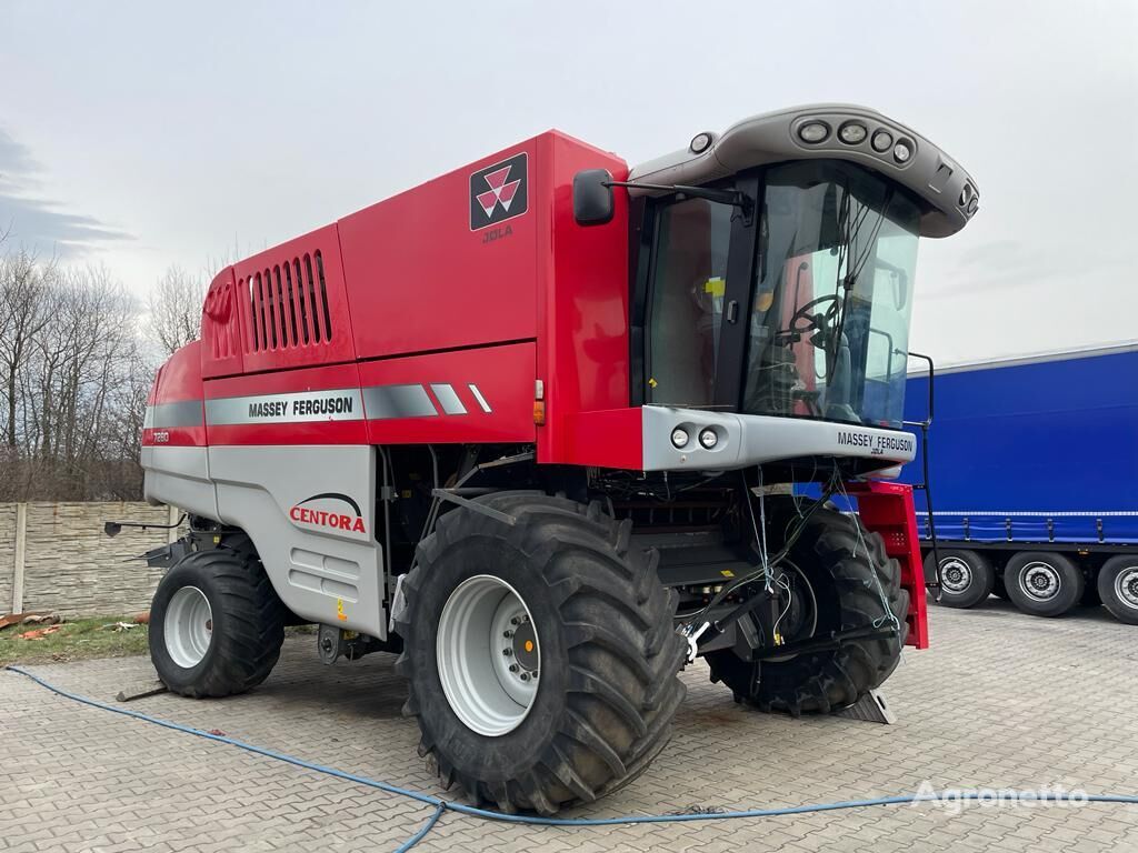 damaged Massey Ferguson 7280 grain harvester